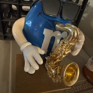 M&M'S Blue Character with Gold Saxophone